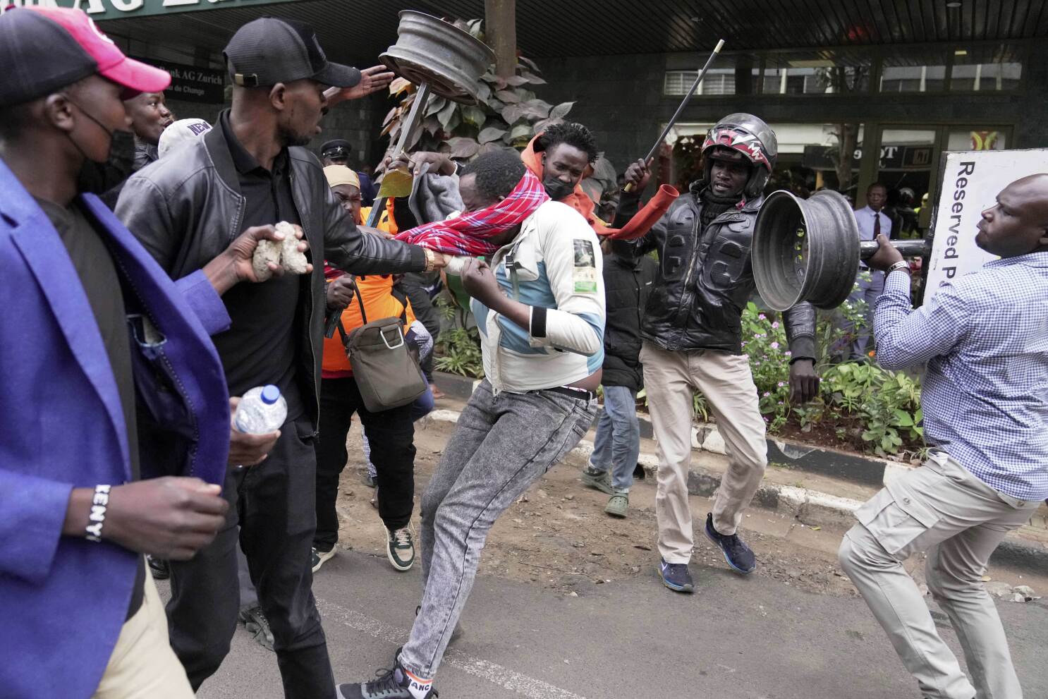 Kenyan police shoot protester at close range during protests over blogger's death
