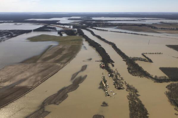 FILE - Backwater flooding covers stretches of farm land on March 17, 2019, near Yazoo City, Miss. Federal officials presented a proposal Thursday, May 4, 2023, to further control flooding in the Mississippi Delta, a move that comes after months of work from government agencies and decades of delays amid disputes over potential environmental impacts. (AP Photo/Holbrook Mohr, File)
