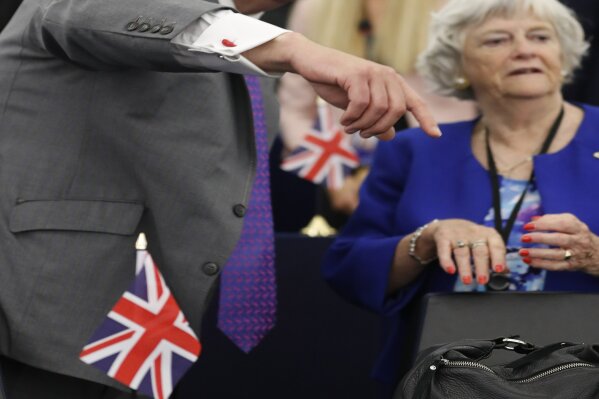 Brexit Party chairman Nigel Farage arrives in the European Parliament in Strasbourg, eastern France, Tuesday July 2, 2019. The first session of the new Parliament will open later today. (AP Photo/Jean-Francois Badias)