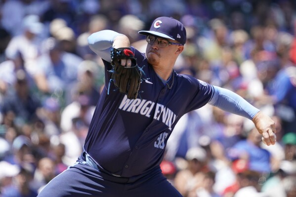 Chicago Cubs pitcher Jordan Wicks throws the ball against the St. Louis Cardinals during the first inning of a baseball game Friday, June 14, 2024, in Chicago. (AP Photo/David Banks)