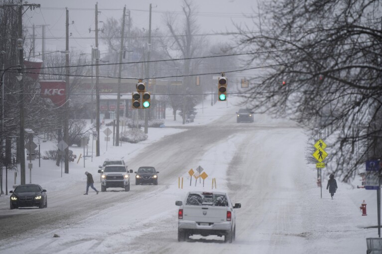 People and traffic are sparse on Rosa L. Parks Blvd. after a winter storm in Nashville, Tenn., Monday, Jan. 15, 2024. (Denny Simmons/The Tennessean via AP)