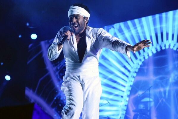 FILE - Donald Glover, who goes by the stage name Childish Gambino, performs at the Governors Ball Music Festival in New York on June 3, 2017. Childish Gambino has returned with a reimagined album and a new tour announcement. Early Monday morning, Glover posted on X that a new album, “ATAVISTA,” had hit streaming platforms. (Photo by Charles Sykes/Invision/AP, File)