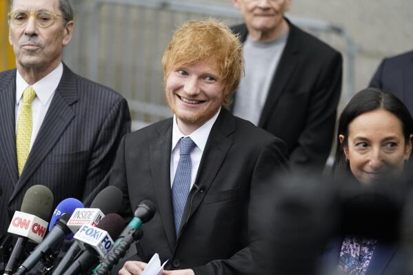 Recording artist Ed Sheeran prepares to speak to the media outside New York Federal Court after wining his copyright infringement trial, Thursday, May 4, 2023, in New York. A federal jury concluded that Sheeran didn't steal key components of Marvin Gaye’s classic 1970s tune “Let’s Get It On” when he created his hit song “Thinking Out Loud.” (AP Photo/John Minchillo)