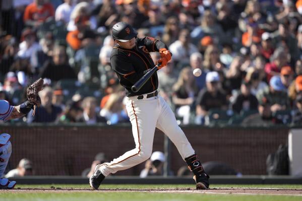 Flores slam, 6 RBIs as Giants thump Cards; Posey honored
