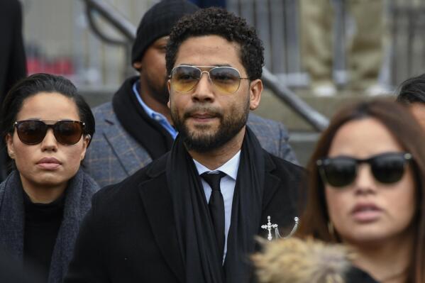 FILE - Former "Empire" actor Jussie Smollett leaves the Leighton Criminal Courthouse in Chicago, Monday Feb. 24, 2020. Smollett is returning to a Chicago courtroom Thursday, March 10, 2022 for sentencing with just two questions hanging over his head: Will he admit that he lied about a racist homophobic attack and will a judge send him to jail? (AP Photo/Matt Marton File)