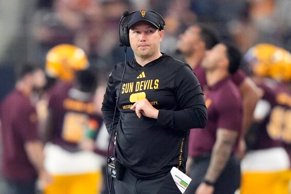 Ariona State head coach Kenny Dillingham stands on the sideline during the first half of the Big 12 Conference championship NCAA college football game against Iowa State in Arlington, Texas, Saturday, Dec. 7, 2024. (AP Photo/LM Otero, File)