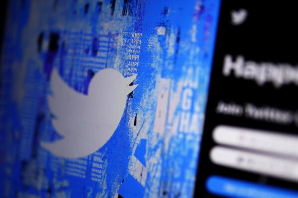 FILE - The Twitter splash page is seen on a digital device, Monday, April 25, 2022, in San Diego. By hiring Linda Yaccarino as Twitter’s new CEO, Friday, May 12, 2023, Elon Musk is welcoming a veteran ad executive to the helm of the social media site. (AP Photo/Gregory Bull, File)