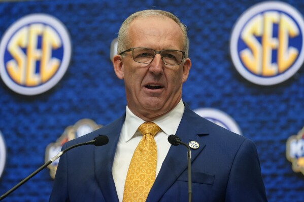 FILE - Southeastern Conference Commissioner Greg Sankey speaks during SEC Media Days, July 18, 2022, in Atlanta. Sankey told University of South Carolina trustees the league's union with the Big Ten Conference was created to provide leadership for a challenging landscape in college athletics. It is not, he said, a breakaway framework for the two healthiest, wealthiest leagues to run the game.(APPhoto/John Bazemore, File)