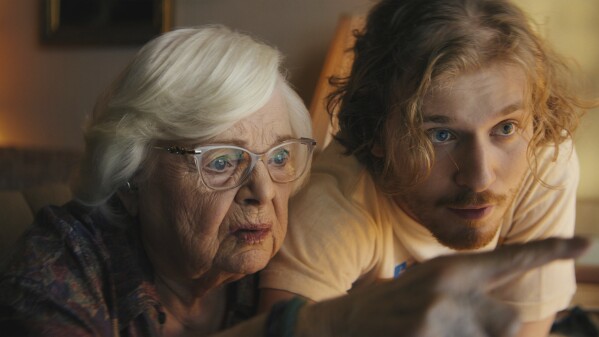 This image released by the Sundance Institute shows June Squibb, left, and Fred Hechinger in a scene from "Thelma" a film by Josh Margolin, an official selection of the Premieres program at the 2024 Sundance Film Festival. (David Bolen/Sundance Institute via AP)