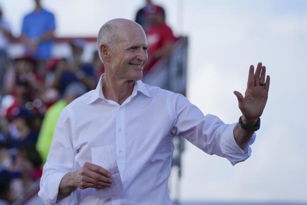 FILE - Sen. Rick Scott, R-Fla., arrives to speak before former President Donald Trump at a campaign rally in support of the campaign of Sen. Marco Rubio, R-Fla., at the Miami-Dade County Fair and Exposition on Nov. 6, 2022, in Miami. Scott is mounting a long-shot bid to unseat Senate Republican leader Mitch McConnell, a rare challenge for the longtime GOP stalwart after his party failed to win back the majority in the midterm elections. (AP Photo/Rebecca Blackwell, File)