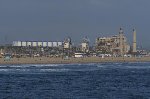 This May 2, 2022, photo shows the AES Huntington Beach Energy Center in Huntington Beach, Calif. The AES facility, the proposed site of the Poseidon Huntington Beach Seawater Desalination Plant will face a critical vote by the California Coastal Commission (CCC) on Thursday, May 12. The highly contested project has been debated for more than two decades.  (AP Photo/Damian Dovarganes)