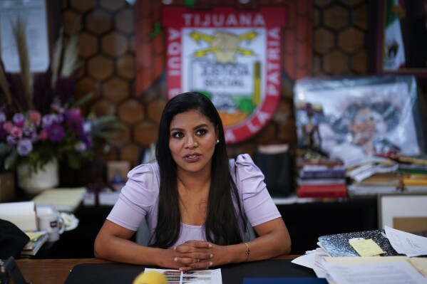 FILE - Tijuana Mayor Montserrat Caballero speaks during an interview in her office in Tijuana, Mexico, Aug. 24, 2023. Caballero rose to fame in 2022, after gangs carjacked and burned at least 15 vehicles throughout the city, when she made a direct public appeal to cartels to stop targeting civilians. (AP Photo/Gregory Bull, File)