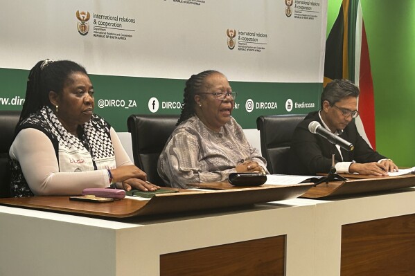 South African Foreign Minister Naledi Pandor, center, adresses a news conference in Pretoria, South Africa, Wednesday, Jan. 31, 2024. Pandor said that Israel has already ignored the ruling against it last week by the U.N.'s top court by killing hundreds more civilians in Gaza in a matter of days, while her country has also asked why an arrest warrant for Israeli Prime Minister Benjamin Netanyahu has not been issued in another case South Africa has brought at the separate International Criminal Court. (AP Photo/Sebabatso Mosamo)
