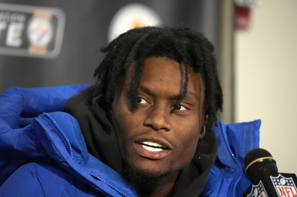 Pittsburgh Steelers wide receiver George Pickens meets with reporters following an NFL football game against the Baltimore Ravens in Pittsburgh, Sunday, Oct. 8, 2023. (AP Photo/Gene J. Puskar, File)