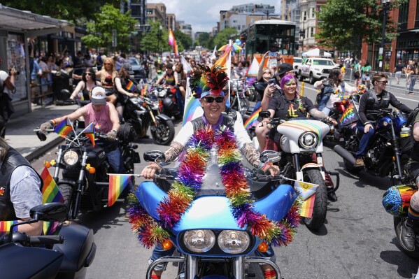 People ride motorcycles during the World Pride parade, Saturday, June 7, 2025, in Washington. (AP Photo/Julia Demaree Nikhinson)