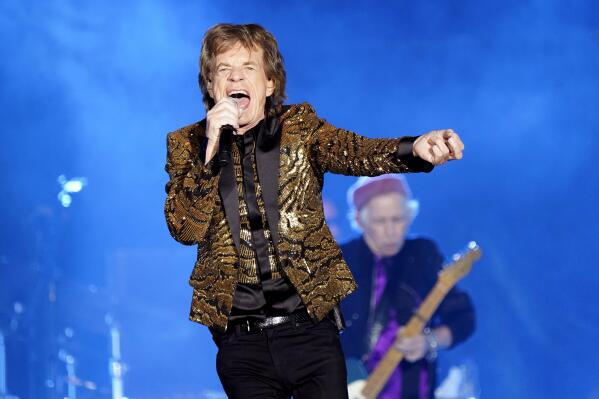 FILE - Mick Jagger, of the Rolling Stones, performs during the band's "No Filter" tour on Monday, Nov. 15, 2021, at Ford Field in Detroit. The Rolling Stones plan to release what they’re calling their “ultimate live greatest hits album,” with appearances by Lady Gaga, Bruce Springsteen, Gary Clark Jr. and The Black Keys, early next year.“GRRR Live!” contains songs recorded live on Dec. 15, 2012, at Newark, New Jersey’s Prudential Center. (Photo by Rob Grabowski/Invision/AP, File)
