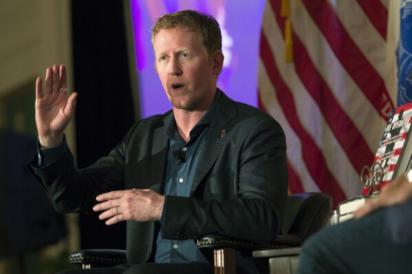 FILE -- Former Navy SEAL Robert O'Neill, who claims to have fatally shot Osama Bin Laden, talks about joining the service at the Richard Nixon Presidential Library and Museum in Yorba Linda, Calif., Wednesday, July 26, 2017. O'Neill has a small ownership stake in Armed Forces Brewing Company and has served as its brand ambassador. His recent social media complaint about a Navy sailor who performs as a drag queen and a police report alleging he used a racial slur are fueling efforts to stop the brewery from opening in military friendly Norfolk, Va. (Matt Masin/The Orange County Register via AP)