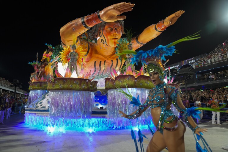 Performers from the Salgueiro samba school parade during Carnival celebrations at the Sambadrome in Rio de Janeiro, Brazil, early Monday, Feb. 12, 2024. (APPhoto/Silvia Izquierdo)