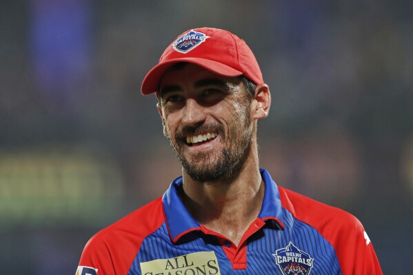 Delhi Capitals' Mitchell Starc gestures during the Indian Premier League cricket match between Delhi Capitals and Kolkata Knight Riders at Arun Jaitley Stadium in New Delhi, India, Tuesday, April 29, 2025. (AP Photo)