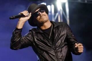 FILE - In this Wednesday, Oct. 17, 2018 file photo, Kid Rock performs in Pontiac, Mich. The owners of the Detroit sports arena housing Kid Rock's restaurant say the musician recently filmed delivering a vulgarity-laced rant against Oprah Winfrey won't renew his licensing agreement for the eatery. An Ilitch Holdings official said Wednesday, Dec. 4, 2019, Kid Rock “voluntarily decided” not to renew the deal coming up in April inside Little Caesars Arena (AP Photo/Paul Sancya File)