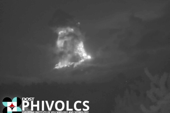 This grab taken from video footage recorded with a thermal camera on June 3, 2024, and provided by DOST-PHIVOLCS, shows the Kanlaon volcano erupting in Canlaon City, Negros, Philippines. (Joeal Calupitan/DOST-PHIVOLCS via AP)