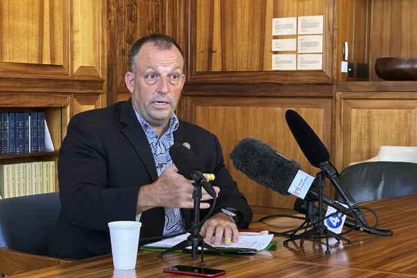 Hawaii Gov. Josh Green speaks to the media, in Honolulu, Friday, Sept. 8, 2023. (AP Photo/Audrey McAvoy)