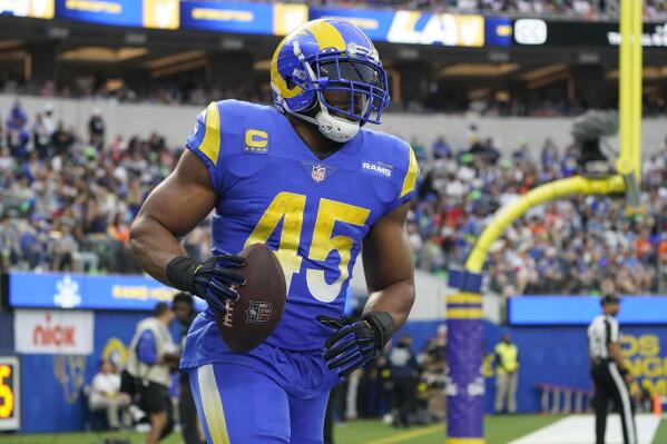 Protester tackled by LA Rams linebacker Bobby Wagner as he ran onto field, News