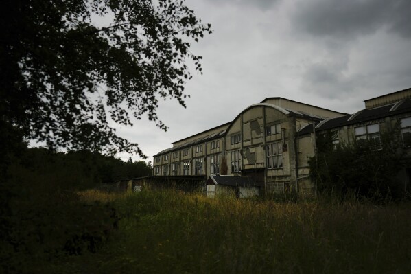 An abandoned pithead constructing is pictured in Henin-Beaumont, northern France, Sunday, June 30, 2024. A miserable aged mining city is on the heart of French some distance-correct chief Marine Le Pen's prolonged-term political scheme. Her celebration's electoral success Sunday came as no surprise to the a whole bunch of fierce supporters who had gathered in the city of Henin-Beaumont to study about her victory speech. (AP Photo/Thibault Camus)