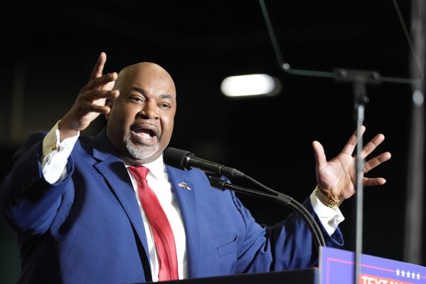 North Carolina Lt. Gov. Mark Robinson speaks before Republican presidential candidate former President Donald Trump at a campaign rally Saturday, March 2, 2024, in Greensboro, N.C. (AP Photo/Chris Carlson)