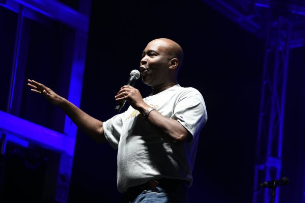 Democratic U.S. Senate candidate Jaime Harrison speaks at a drive-in campaign rally and concert on Monday, Oct. 26, 2020, in Columbia, S.C. (AP Photo/Meg Kinnard)