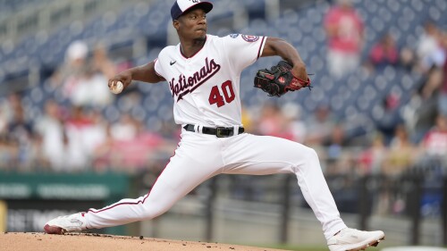 Washington Nationals starting pitcher Josiah Gray throws to the Cincinnati Reds in the first inning of a baseball game, Wednesday, July 5, 2023, in Washington. (AP Photo/Patrick Semansky)