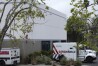 Armored trucks are parked outside the GardaWorld facility in the Sylmar section of Los Angeles on Thursday, April 4, 2024. Thieves stole as much $30 million in an Easter Sunday burglary at a Los Angeles money storage facility in one of the largest cash heists in city history. (AP Photo/Richard Vogel)