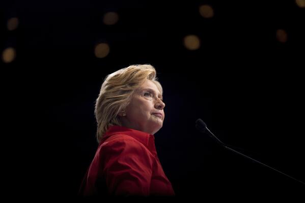 FILE - In this July 30, 2016 file photo, then Democratic presidential candidate Hillary Clinton pauses while speaking at a rally in Pittsburgh. (AP Photo/Andrew Harnik)