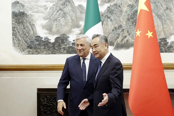 CAPTION CORRECTS THE DAY In this photo released by Ministry of Foreign Affairs of the People's Republic of China, China's Foreign Minister Wang Yi, right, meets with Italian Deputy Premier and Foreign Minister Antonio Tajani in Beijing Monday, Sept. 4, 2023. China's foreign minister is seeking to sell his Italian counterpart on the benefits of leader Xi Jinping's signature 
