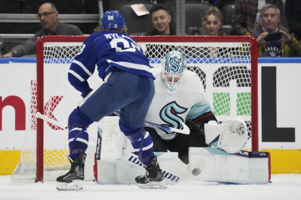 Seattle Kraken goaltender Martin Jones (30) stops Toronto Maple Leafs right wing William Nylander (88) during the first period of an NHL hockey game Thursday, Jan. 5, 2023, in Toronto. (Frank Gunn/The Canadian Press via AP)