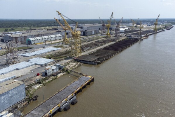 The old Avondale Shipyard in Bridge City, La., Friday, May 26, 2023. Plans by the Port of South Louisiana to purchase the shipyard for construction of military vessels have been delayed. The port in January had announced plans to purchase the old Avondale Shipyard site from port terminal operator T. Parker Host. The Times-Picayune/The New Orleans Advocate reported Wednesday, Oct. 11, that the purchase has been put off after port officials faced questions last month from the state Bond Commission. (David Grunfeld/The Times-Picayune/The New Orleans Advocate via AP)