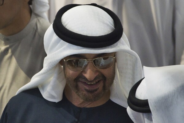 Sheikh Mohammed bin Zayed Al Nahyan, the president of the United Arab Emirates and the ruler of Abu Dhabi, smiles while attending the Dubai Air Show in Dubai, United Arab Emirates, Wednesday, Nov. 15, 2023. (AP Photo/Jon Gambrell)