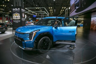 FILE - An electric battery-powered Kia EV9 sport utility is shown at the New York International Auto Show, April 6, 2023, in New York. Kia Corp. announced on Wednesday, July 12, that it would invest $200 million to assemble the EV9 at its factory in West Point, Ga. (AP Photo/Ted Shaffrey, File)