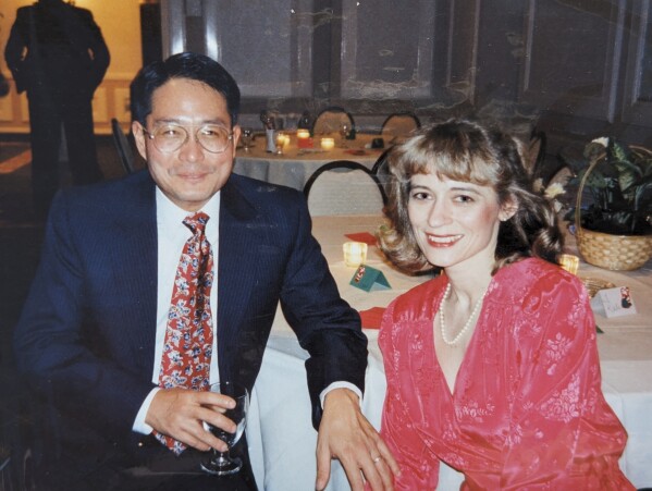 This undated photo provided by Rod Azama shows Azama with his wife Susan Azama at a party in Md. Eight states and Washington D.C. allow physician-assisted death for certain terminally ill patients, like Susan Azuma, but only for their own residents. Vermont and Oregon permit any qualifying American to travel to their state for the practice, so the Maryland resident traveled to Oregon. (Rod Azama via AP)