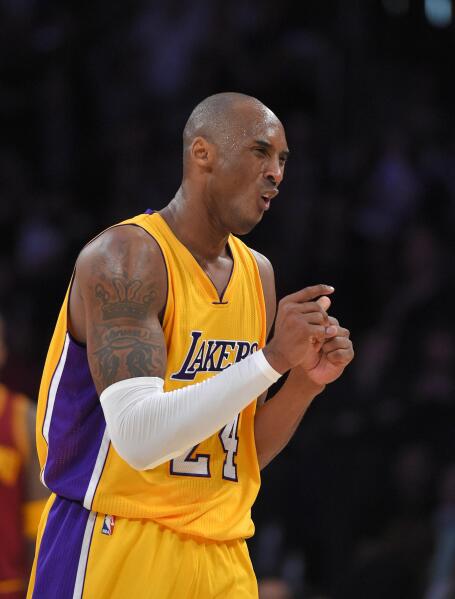 Kobe Bryant of the Los Angeles Lakers reacts after making a