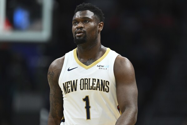 New Orleans Pelicans forward Zion Williamson (1) looks on during the first half of an NBA basketball game against the Charlotte Hornets, Saturday, Jan. 25, 2025, in Charlotte, N.C. (AP Photo/Matt Kelley, File)