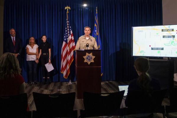 CORRECTS TO JASON JOHANSSON, INSTEAD OF NICK FARESE - CORRECTS RANK - Las Vegas police Lt. Jason Johansson speaks during a news conference Tuesday, Sept. 19, 2023, in Las Vegas. Las Vegas police on Tuesday announced a second teenager has been arrested in a series of hit-and-run crashes, including the death of a former California police chief who was riding a bicycle last month. (AP Photo/Ty ONeil)