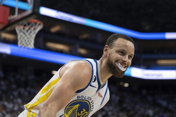 Golden State Warriors guard Stephen Curry (30) all smiles after scoring his 50th point during the second half of Game 7 of an NBA basketball first-round playoff series against the Sacramento Kings, Sunday, April 30, 2023, in Sacramento, Calif. (AP Photo/José Luis Villegas)