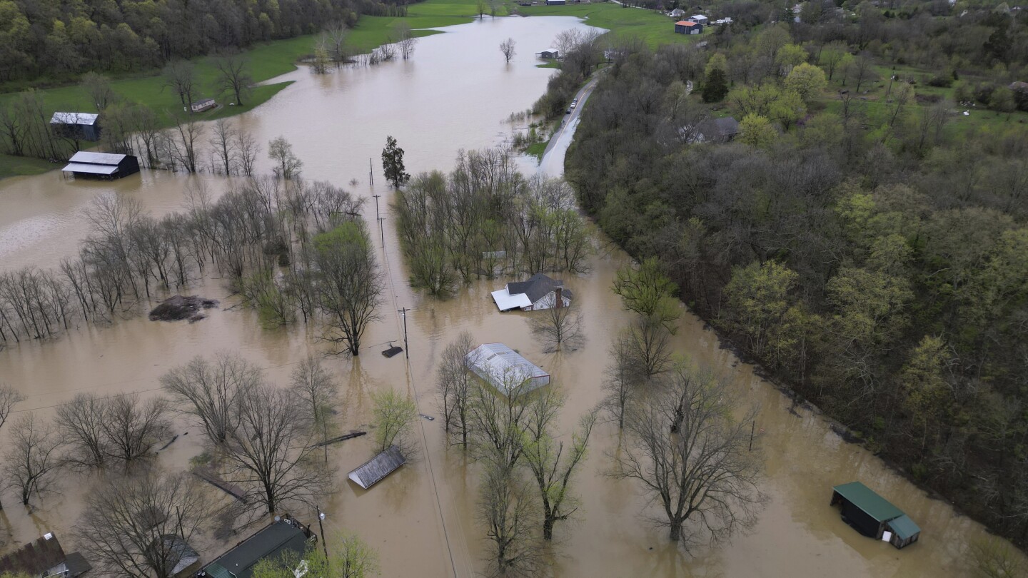 Swollen rivers flood towns in US South after dayslong deluge of rain