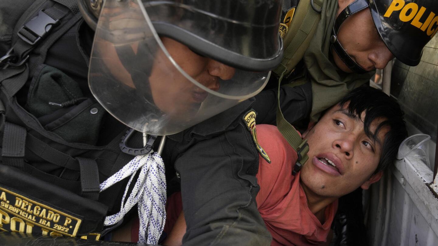 Peru police use tear gas to block protesters from marching