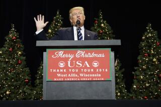 FILE - In this Dec. 13, 2016, file photo, President-elect Donald Trump speaks during a rally at the Wisconsin State Fair Exposition Center in West Allis, Wis. Trump is embracing some of his top attacks on Hillary Clinton as he forms his new administration, engaging in some of the same behavior he used against his rival during the presidential campaign. (AP Photo/Evan Vucci, File)