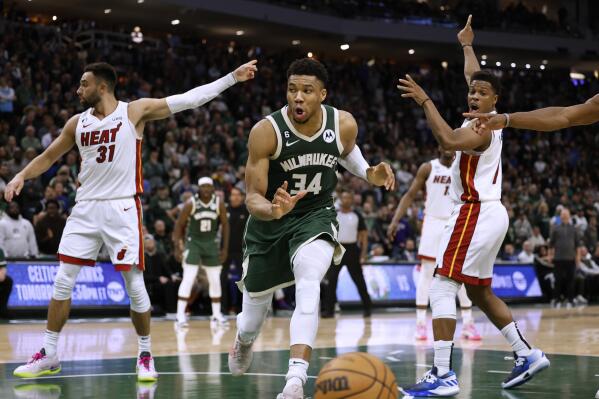 Milwaukee Bucks forward Giannis Antetokounmpo (34) loses the ball out of bounds during overtime of Game 5 of the team's first-round NBA basketball playoff series against the Miami Heat on Wednesday, April 26, 2023, in Milwaukee. The Heat won 128-126, eliminating the Bucks from the playoffs.(AP Photo/Jeffrey Phelps)