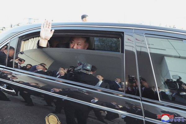 In this photo provided by the North Korean government, North Korean leader Kim Jong Un responds as Russian President Vladimir Putin sends him off from the Vostochny cosmodrome outside the city of Tsiolkovsky, about 200 kilometers (125 miles) from the city of Blagoveshchensk in the far eastern Amur region, Russia, Wednesday, Sept. 13, 2023. Independent journalists were not given access to cover the event depicted in this image distributed by the North Korean government. The content of this image is as provided and cannot be independently verified. Korean language watermark on image as provided by source reads: 