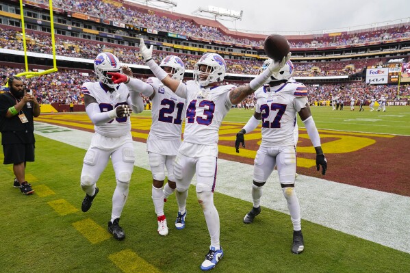 Buffalo Bills linebacker Terrel Bernard (43) celebrating with teammates after recovering a fumble against the Washington Commanders during the second half of an NFL football game, Sunday, Sept. 24, 2023, in Landover, Md. (AP Photo/Andrew Harnik)