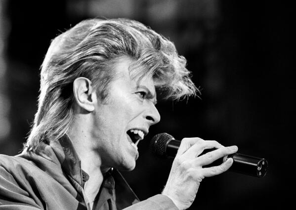 FILE - This is a June 19, 1987 file photo of David Bowie. Bowie, the other-worldly musician who broke pop and rock boundaries with his creative musicianship, nonconformity, striking visuals and a genre-bending persona he christened Ziggy Stardust, died of cancer Sunday Jan. 10, 2016. He was 69 and had just released a new album. (PA, File via AP) UNITED KINGDOM OUT  